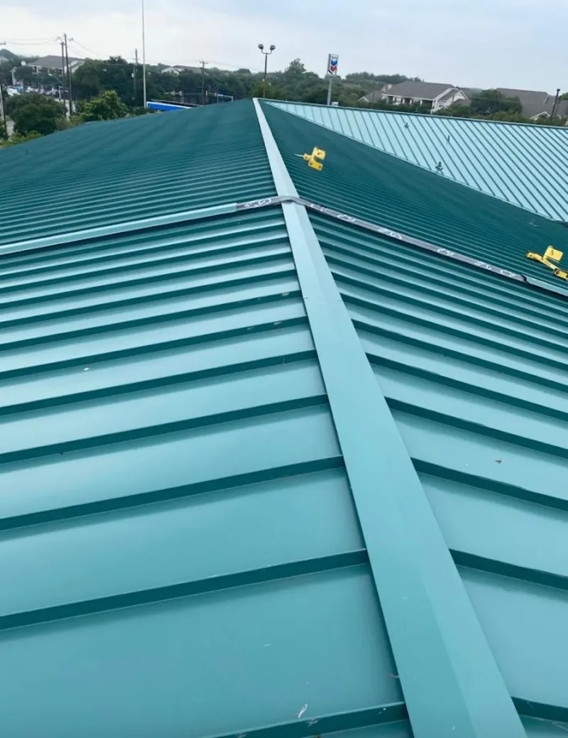 Green commercial metal roof ridge and valley for Metal Roof Repair in Farmers Branch